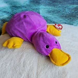 Purple and Yellow Plush Duck Toy